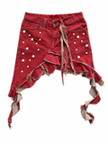FALDA ROJA CON OLANES Y APLICACIONES DORADAS