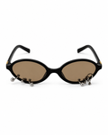 LENTE BEIGE CON MONTURA NEGRA Y PIERCING